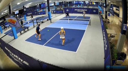 Pickleball players using PodPlay autonomous pickleball software